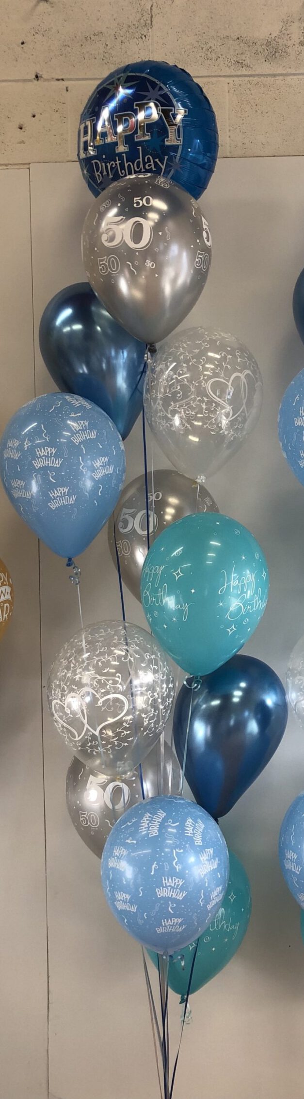Blue and silver balloons in groups of 12