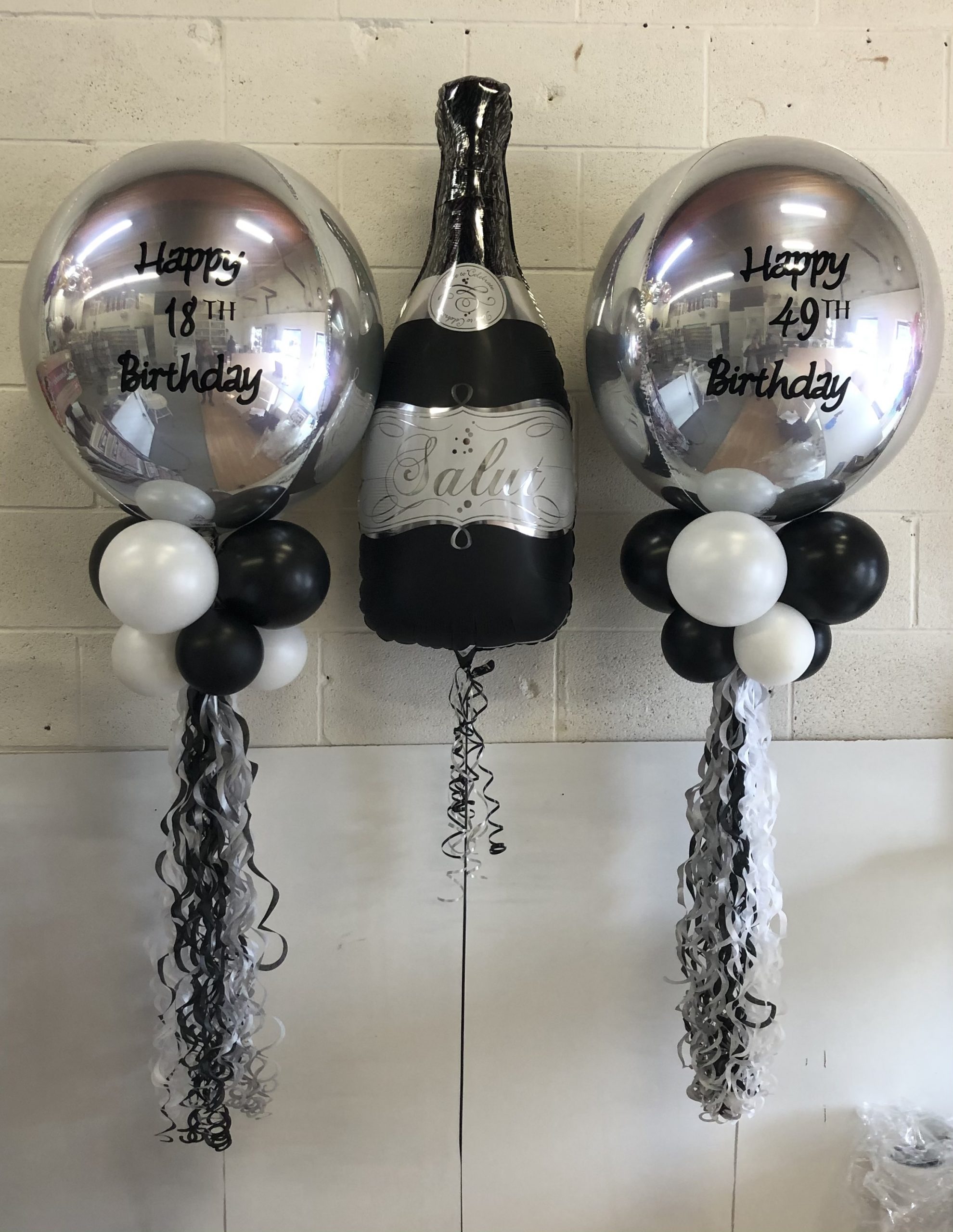 custom balloon orbz with champange bottle
