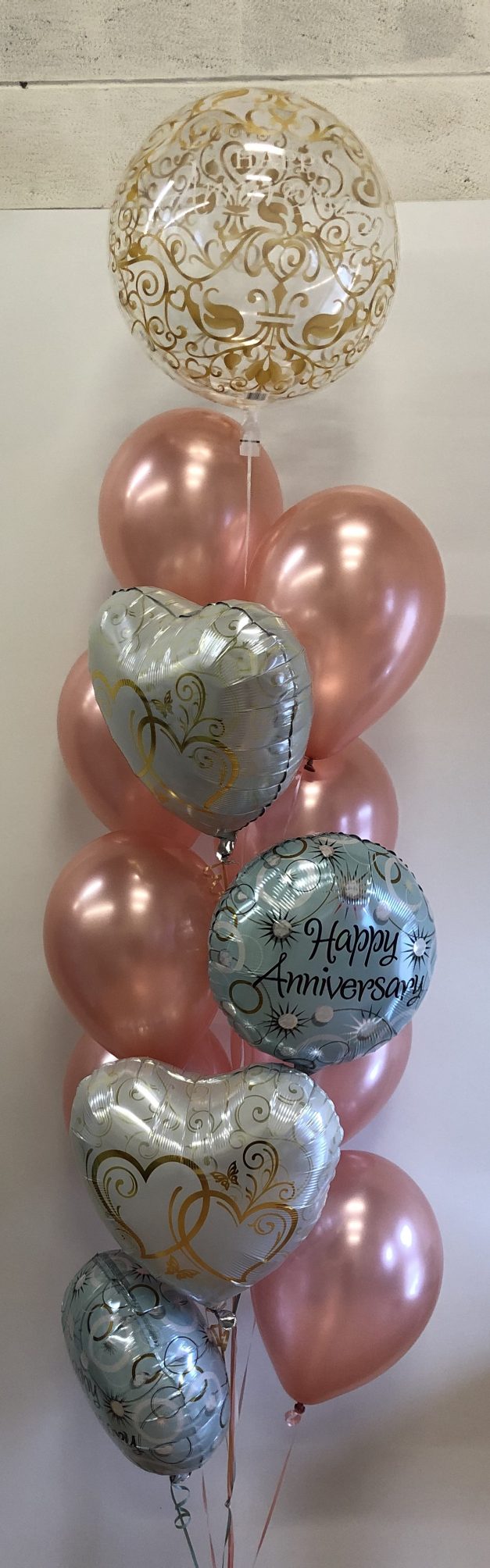 helium pillar of 13 anniversary balloons